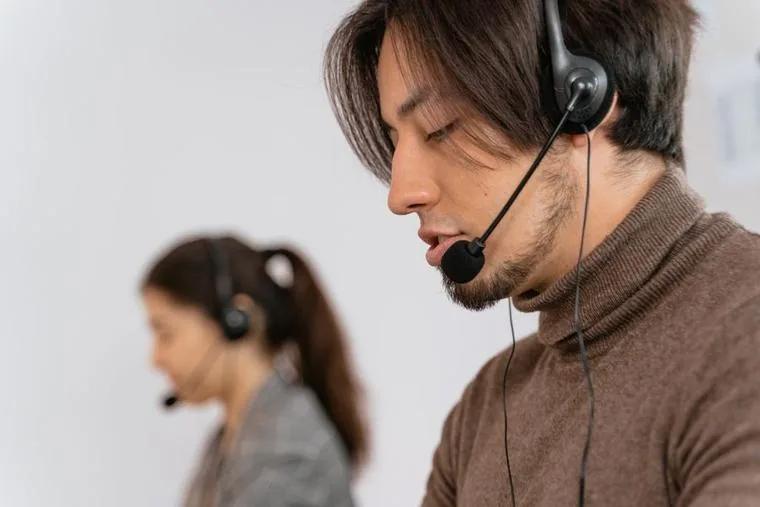 Rezolva helpdesk engineer taking a maintenance call in Singapore