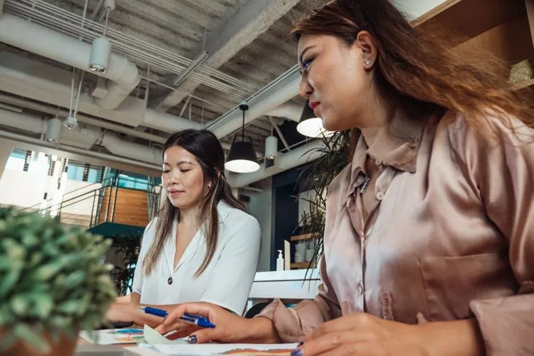 Singapore finance staff reviewing documents, the seats that carry the security risk