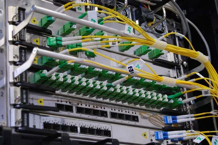 Neatly patched fibre network switch in a Singapore office comms room