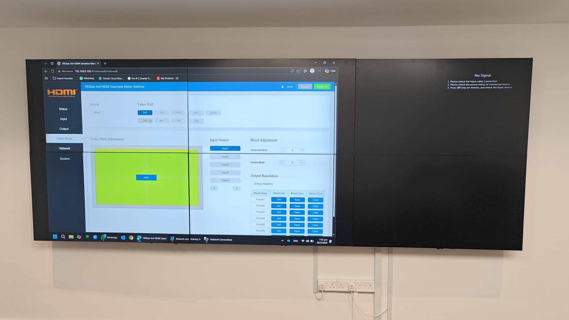 LCD video wall Singapore — 2x2 commercial panels driven by an HDMI matrix switcher, commissioned on site by Rezolva