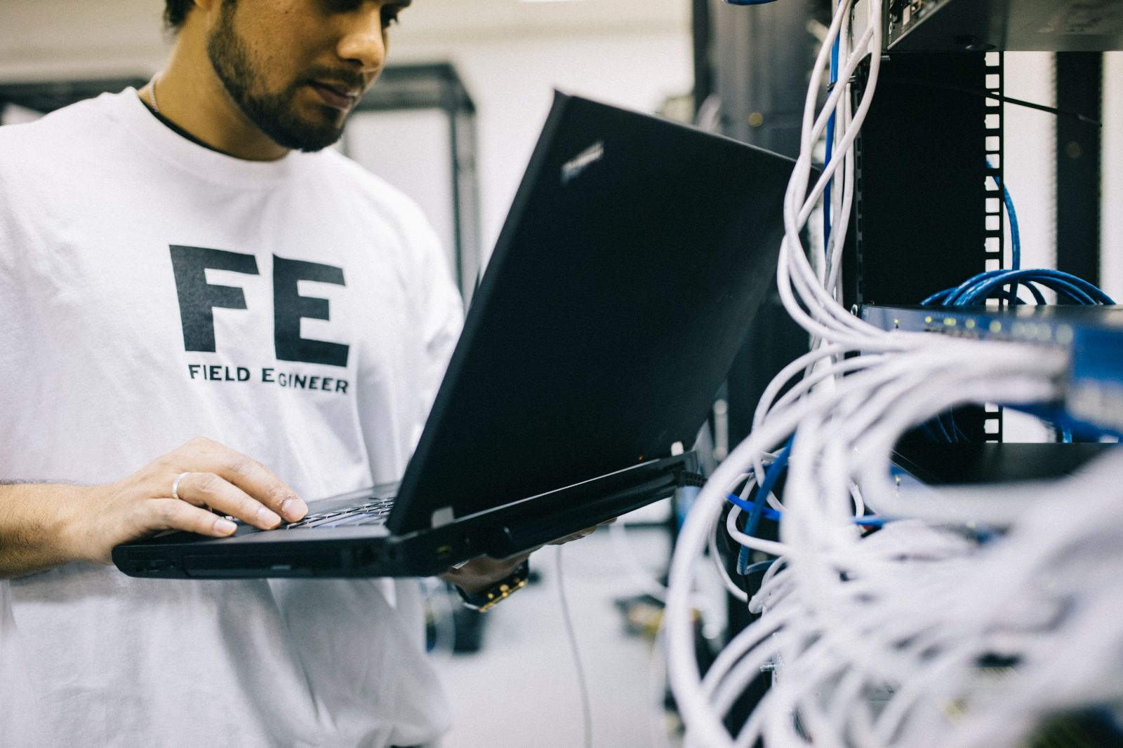 Web hosting company Singapore — engineer hardening servers at the rack